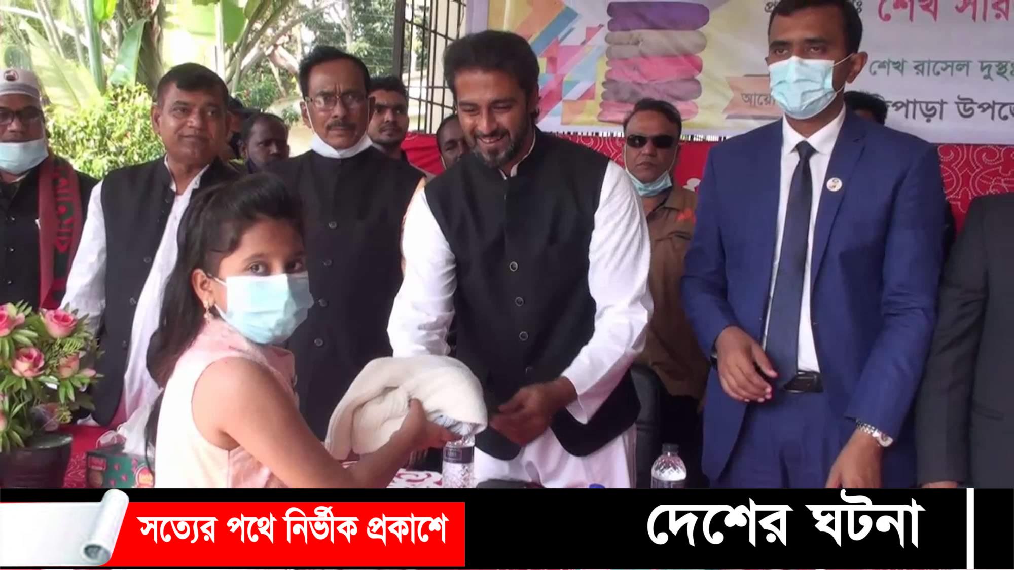 টুঙ্গিপাড়ায় ৪’শ শিশুদের মাঝে শীতবস্ত্র বিতরণ